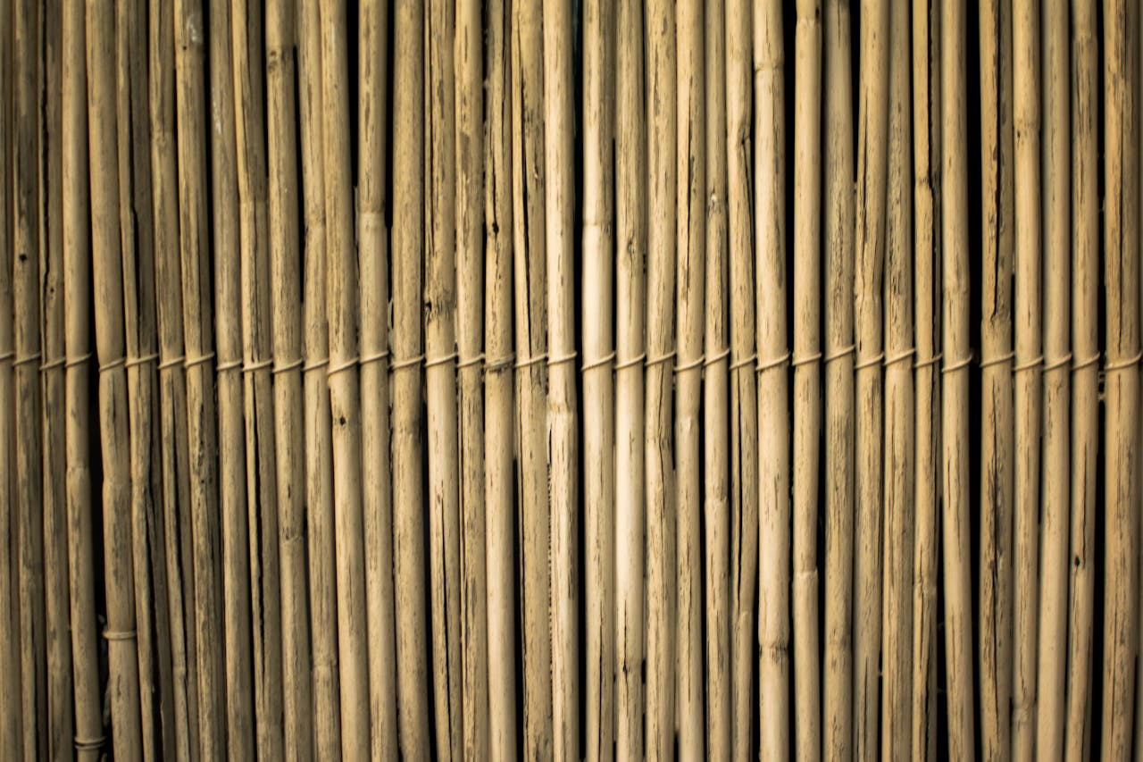 Close-up view of a textured bamboo fence offering a natural and rustic design element.
